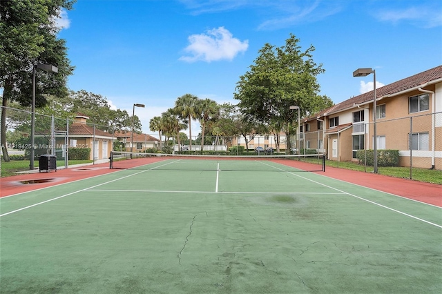 view of tennis court with basketball court