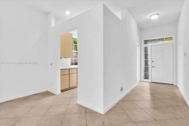 view of tiled foyer entrance