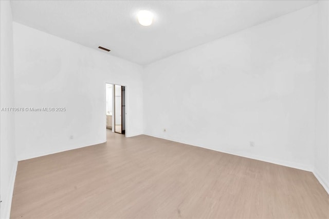 empty room featuring light wood-type flooring