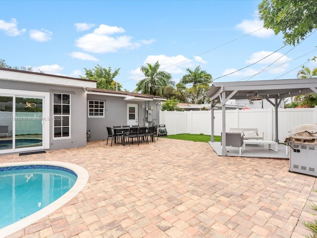 view of pool featuring a pergola and a patio