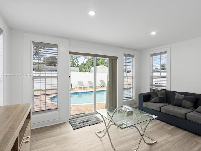 living room with light hardwood / wood-style floors