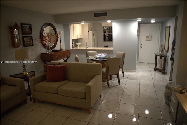 8625 NW 8th St Unit 420, Miami, FL 33126 - living room with sink and light tile patterned floors