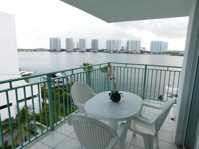 balcony featuring a water view