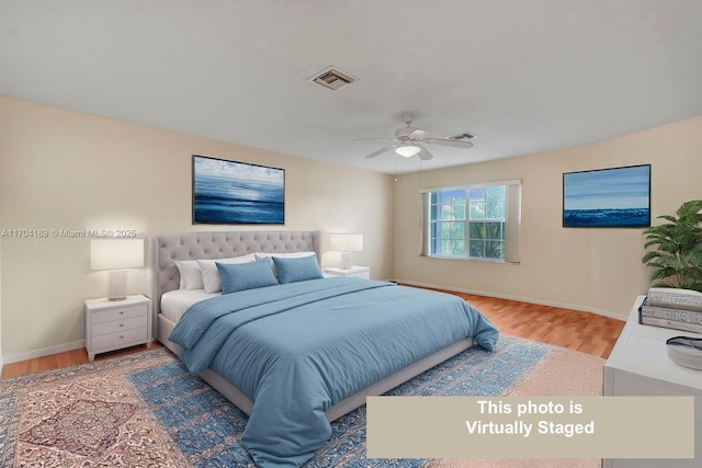 bedroom featuring wood-type flooring and ceiling fan