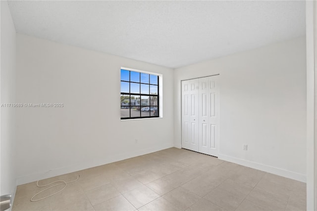 view of tiled empty room