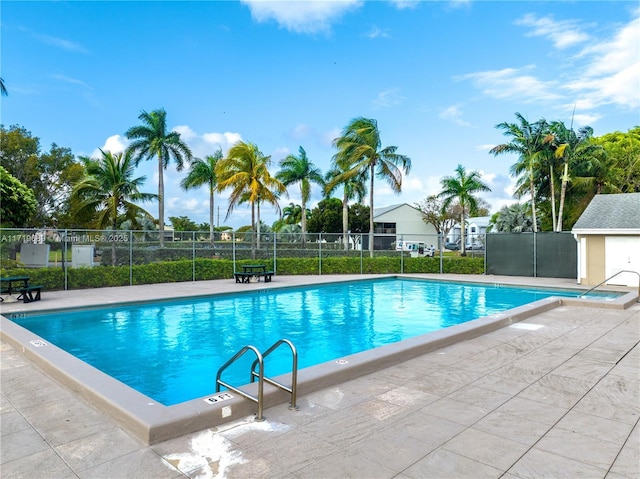 view of swimming pool featuring a patio