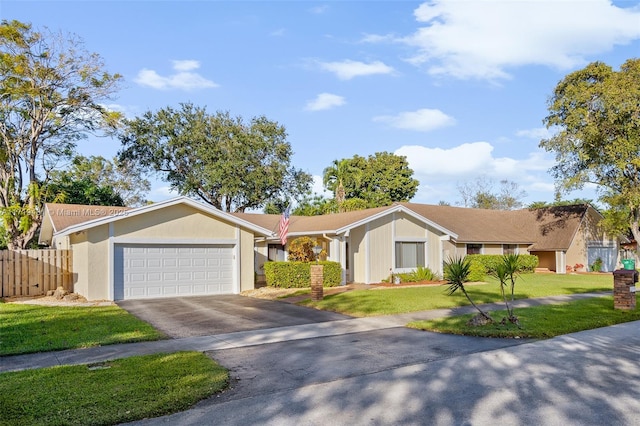 ranch-style house with a front yard and a garage