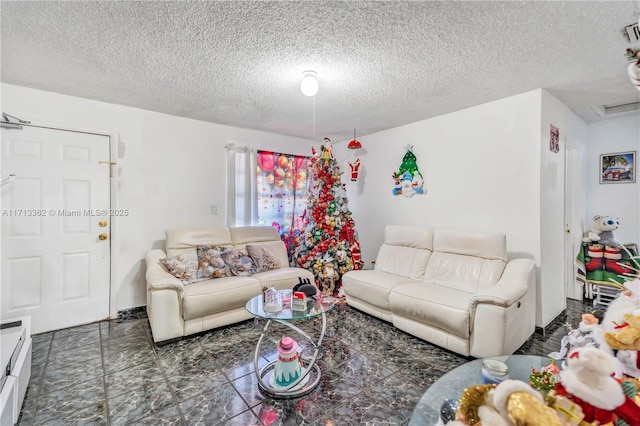 living room with a textured ceiling