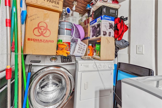 laundry area featuring washing machine and dryer