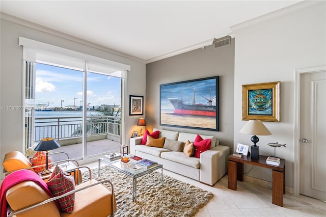 tiled living room featuring a water view and crown molding