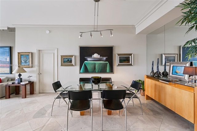 dining room with crown molding