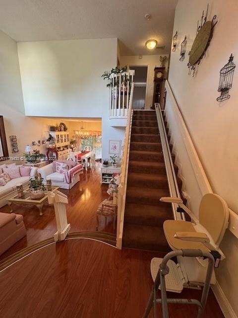 staircase featuring hardwood / wood-style flooring