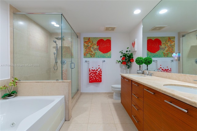 full bathroom featuring tile patterned flooring, vanity, separate shower and tub, and toilet