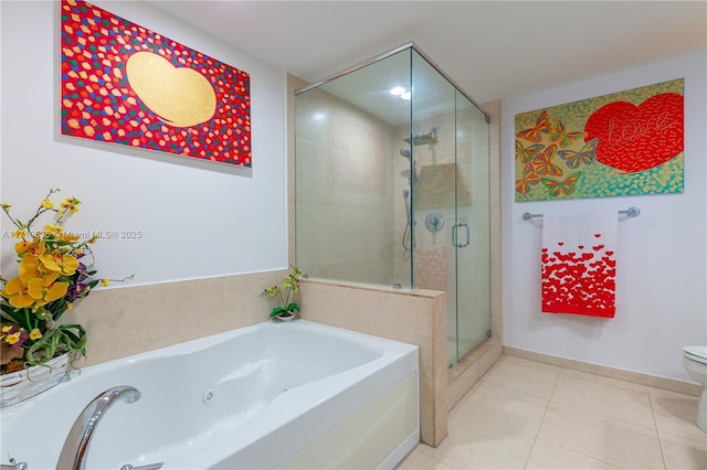 bathroom featuring plus walk in shower, tile patterned floors, and toilet