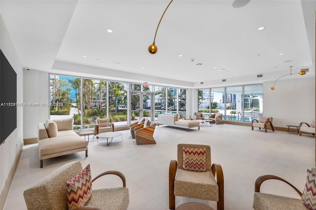 living room featuring plenty of natural light