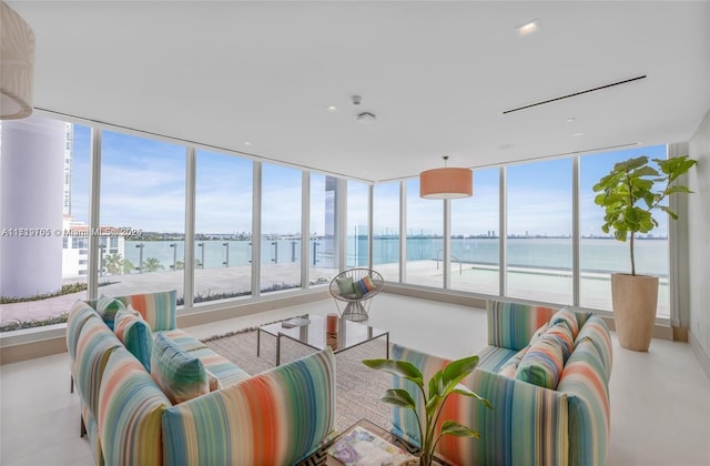 living room featuring a water view