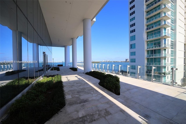 view of patio / terrace with a water view