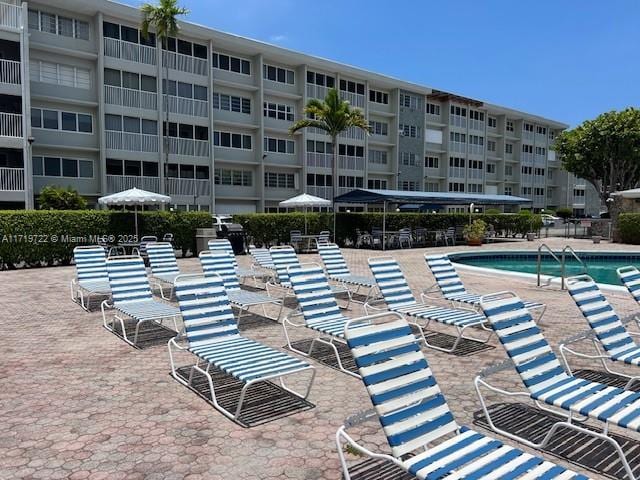 view of pool featuring a patio