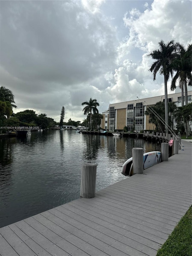 dock area featuring a water view