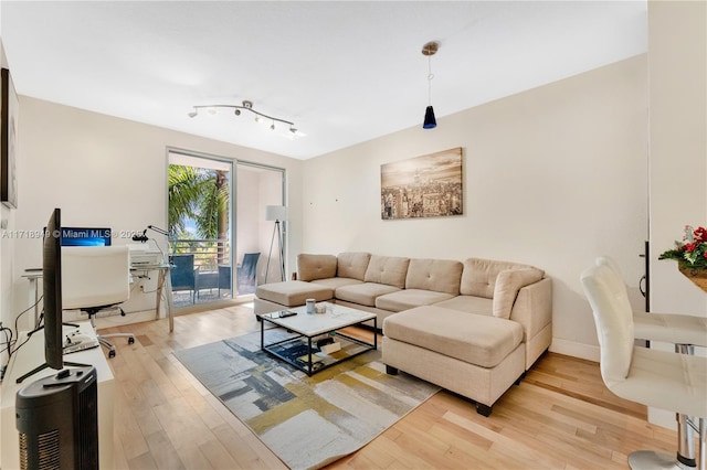 living room with wood-type flooring