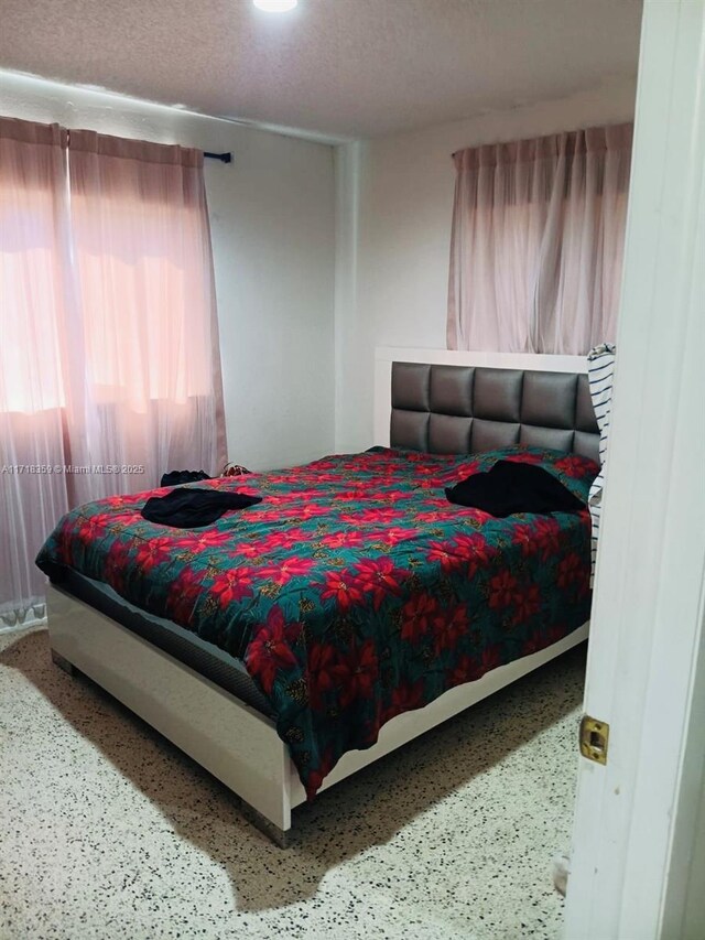 bedroom with a textured ceiling