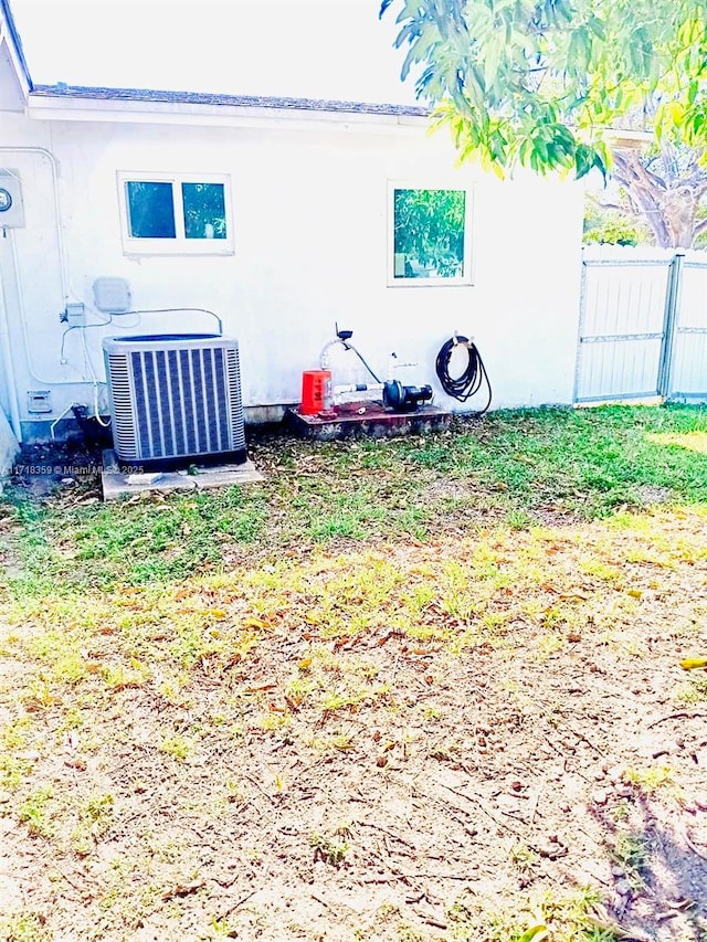 view of yard featuring central AC unit