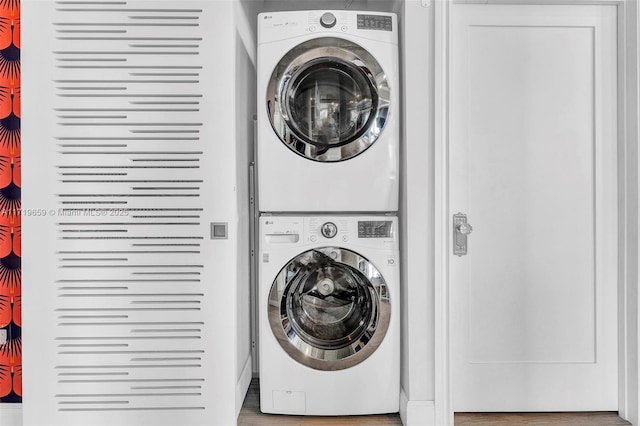 washroom with stacked washer / dryer