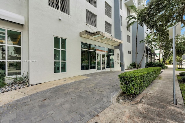 exterior space featuring an AC wall unit