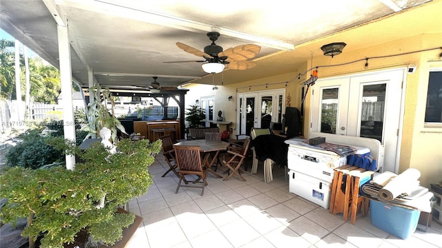 view of patio with ceiling fan and french doors