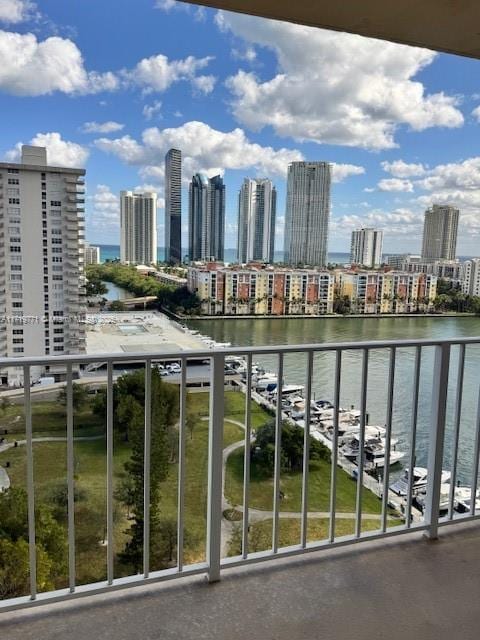 balcony featuring a water view