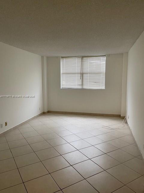 view of tiled empty room