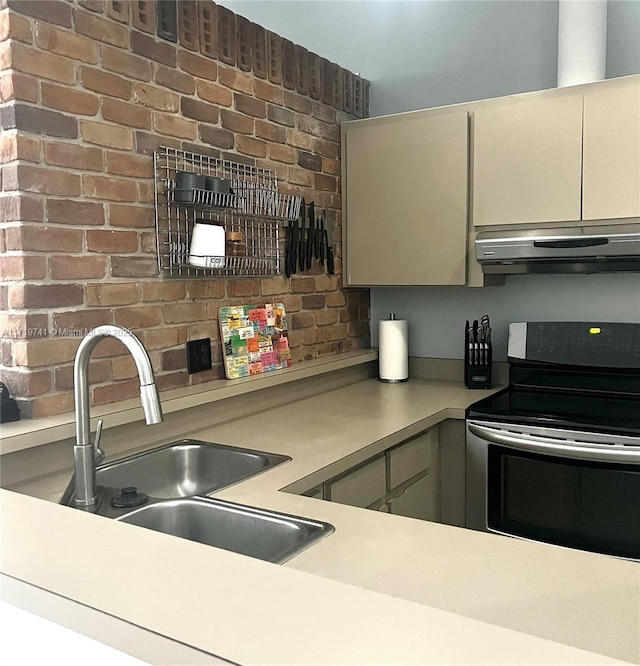 kitchen featuring sink and stainless steel electric range