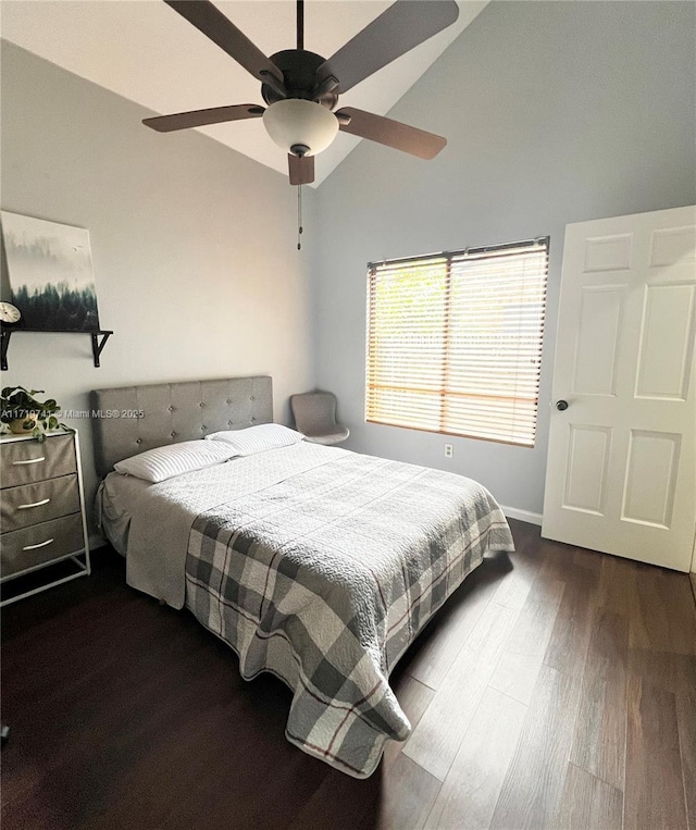 bedroom featuring hardwood / wood-style flooring, ceiling fan, and lofted ceiling