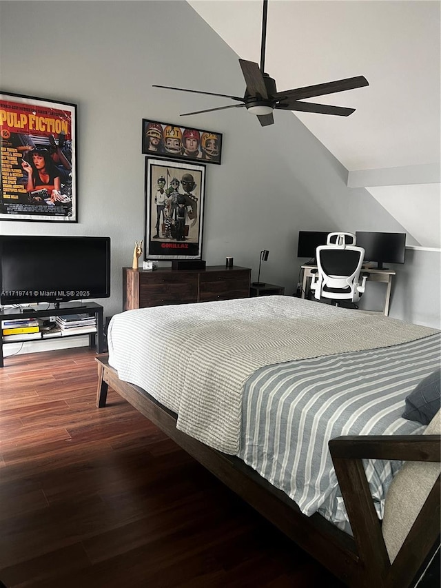 bedroom with hardwood / wood-style flooring, ceiling fan, and lofted ceiling