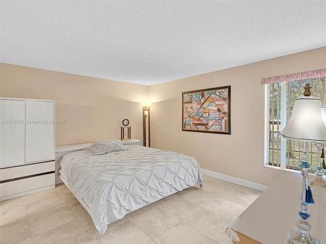 bedroom with a textured ceiling