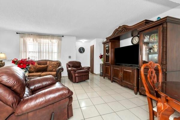 living room featuring light tile patterned floors