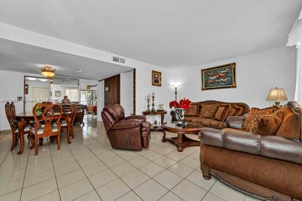 living room featuring light tile patterned flooring