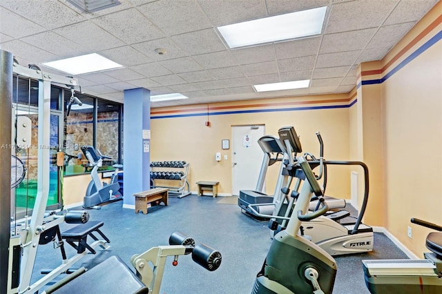 gym featuring a drop ceiling