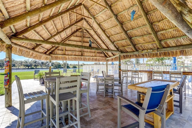 view of patio / terrace with a gazebo and a water view