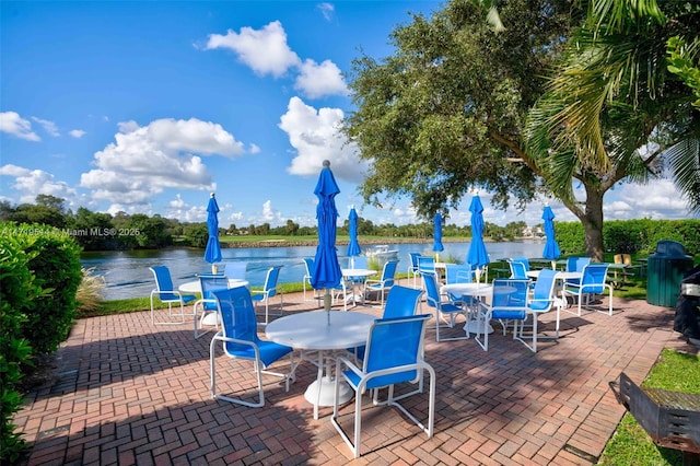 view of patio / terrace with a water view