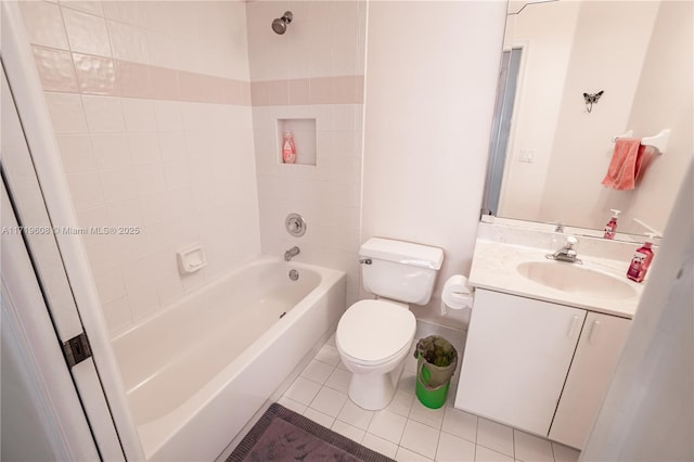 full bathroom with tile patterned flooring, vanity, toilet, and tiled shower / bath combo