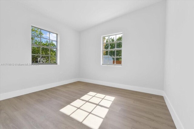 bedroom with light wood-type flooring