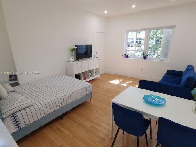 bedroom featuring light hardwood / wood-style flooring