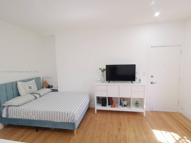 bedroom featuring light hardwood / wood-style floors