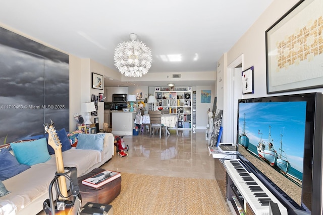 living room featuring a notable chandelier