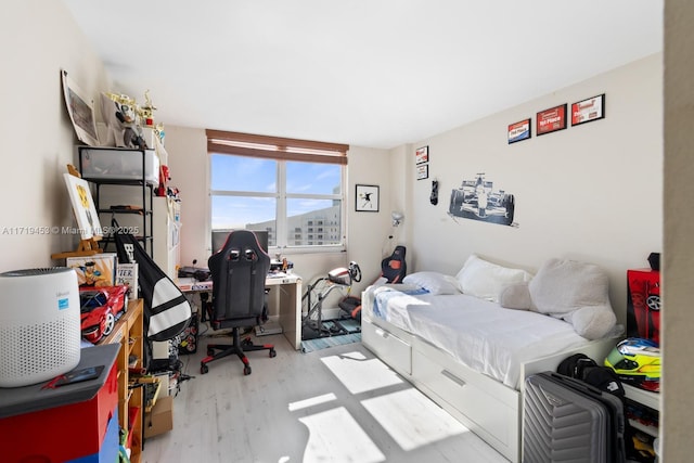 bedroom featuring light hardwood / wood-style flooring