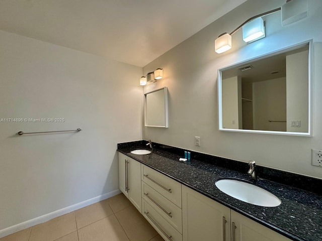 bathroom with vanity and tile patterned floors