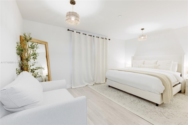 bedroom featuring hardwood / wood-style floors