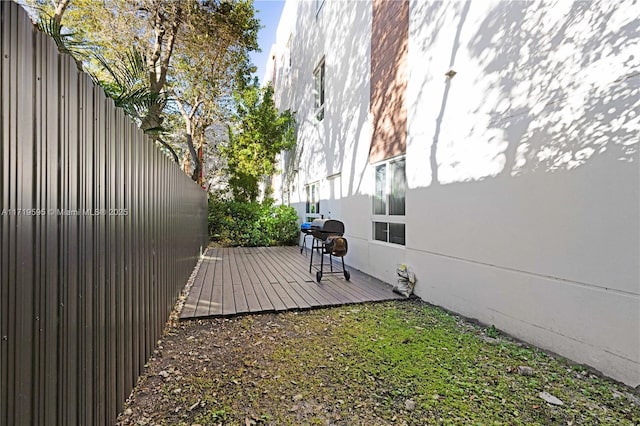 view of yard with a wooden deck