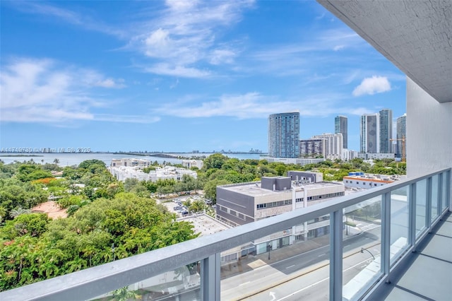 balcony featuring a water view